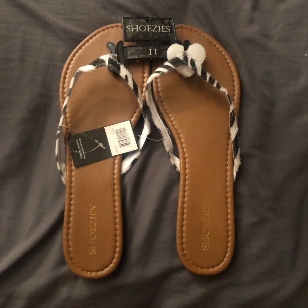 Woman Sandler’s size 11 new